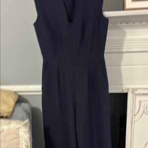 Tahari Blue Sleeveless Jumpsuit with V-neckline and Tailored Silhouette